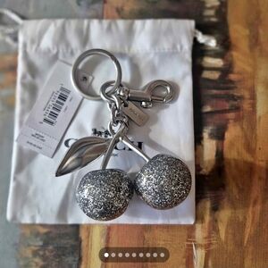 Large Coach Metallic Silver Cherry Keychain